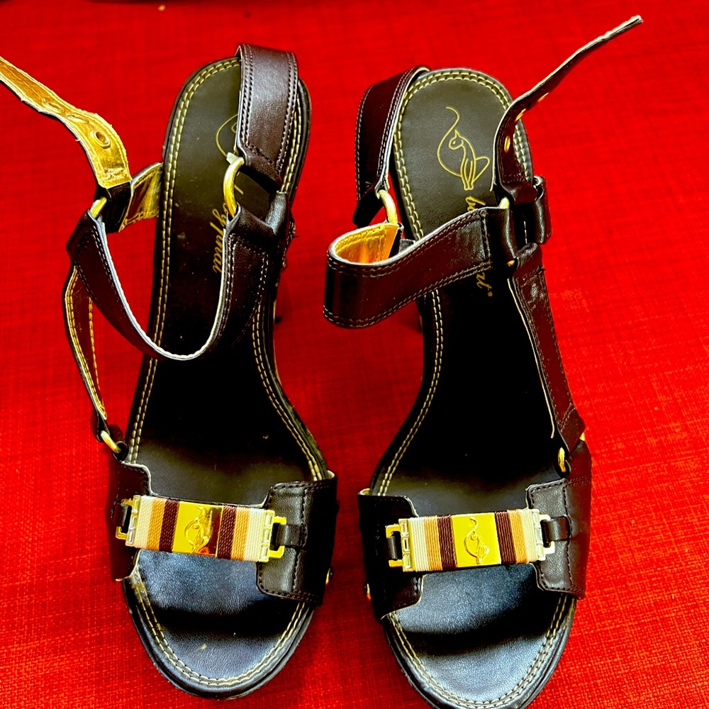 Baby Phat wood heel platform, fairly new only use a few times.